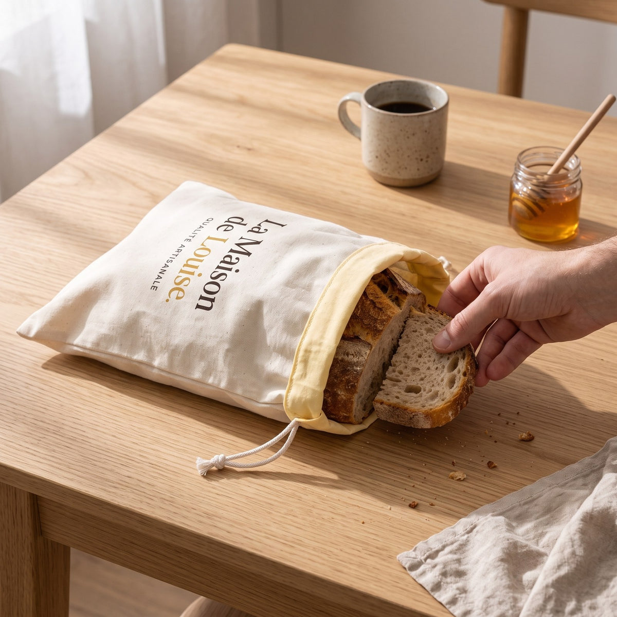 Taking a fresh slice out of the Louise Bag at breakfast