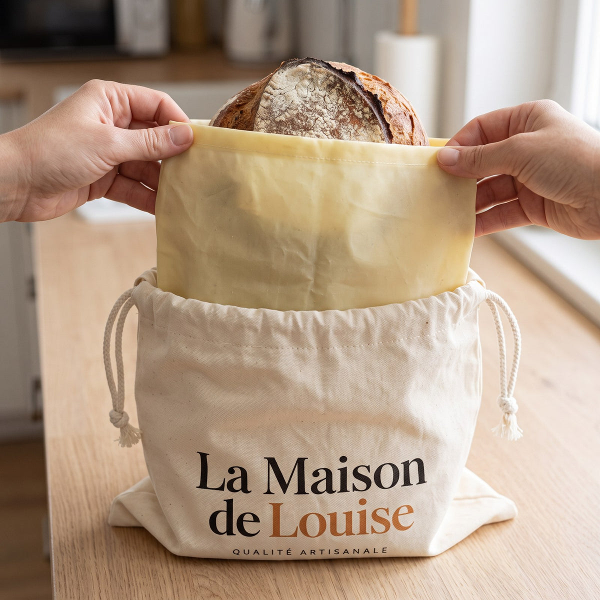 The removable beeswax lining, with the loaf inside, slides into the cotton Louise Bag